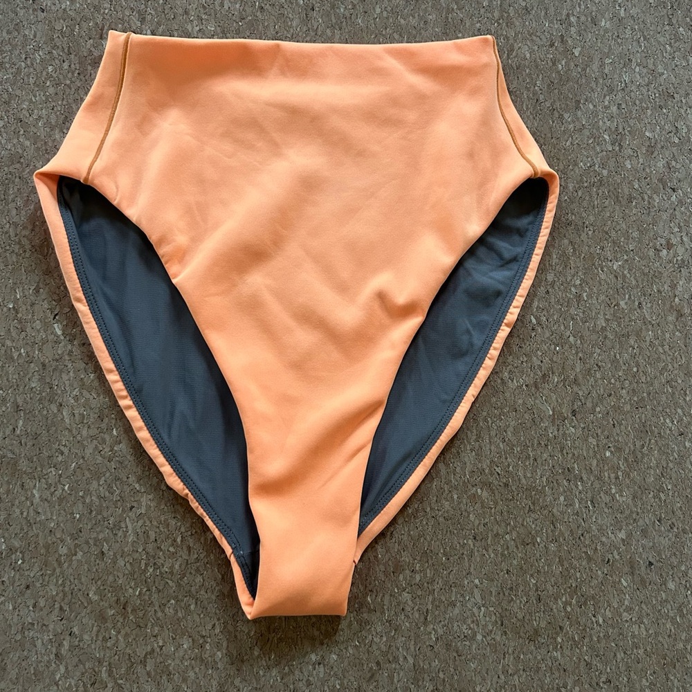 Left on Friday Hi Tide bottom size small orange